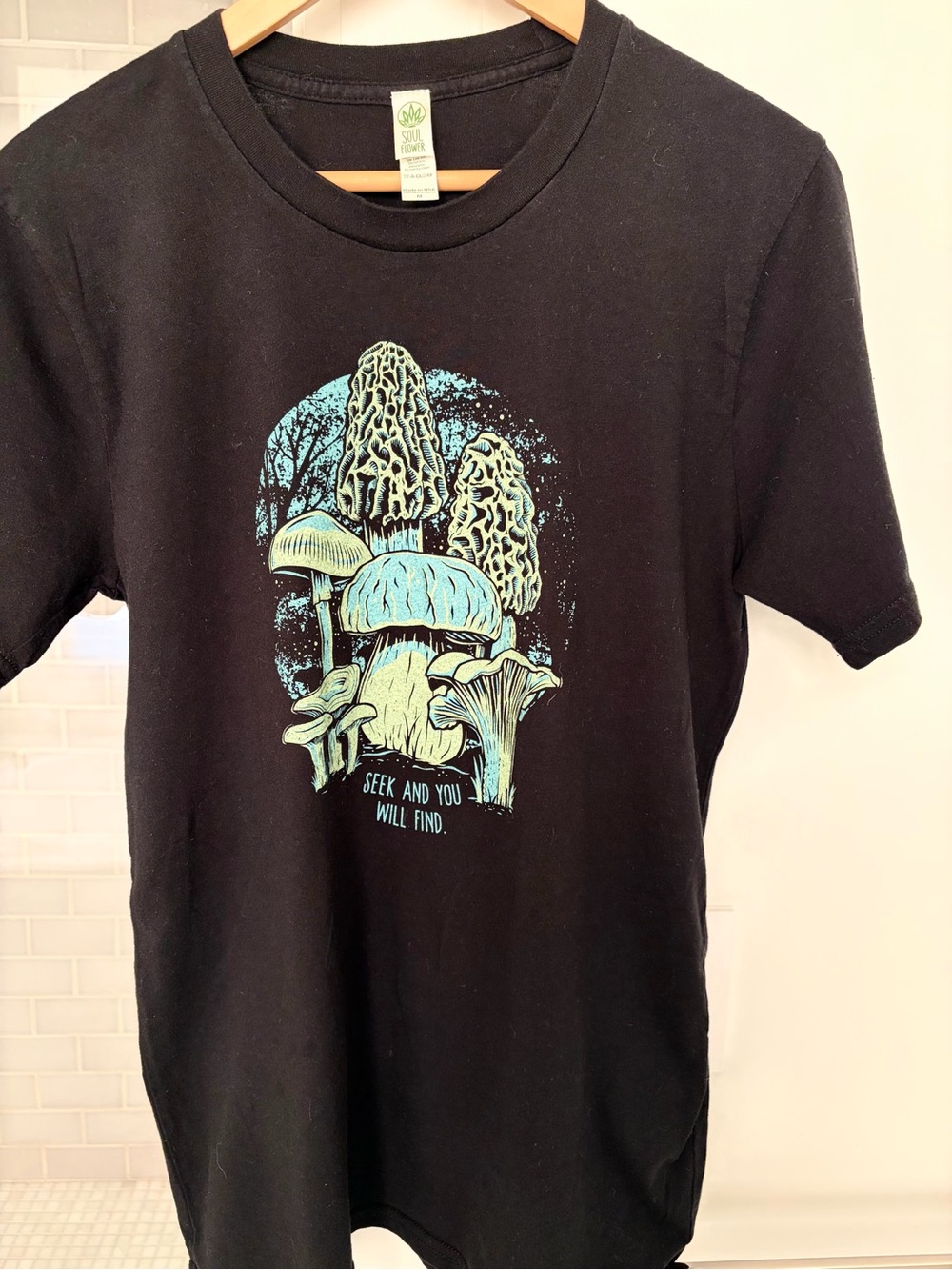 Soul Flower Black Tee with Green Logo Tag
